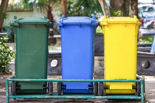 Collection crews and waste vehicles at depot in safety gear